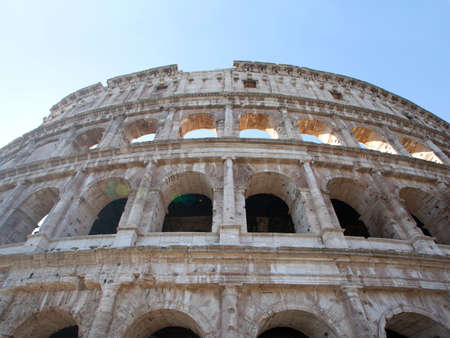 Colosseum in Rome with blue sky in the background