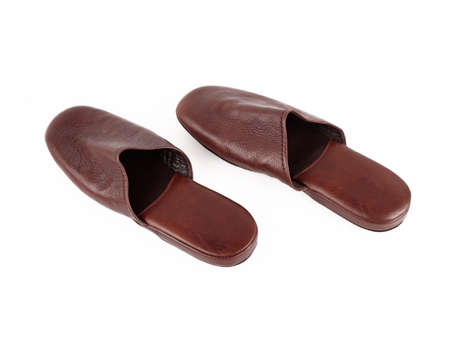 Male brown leather shoes isolated on white backgroundの写真素材