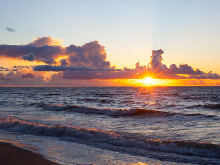 Sunset sea view with cloudy skyの写真素材