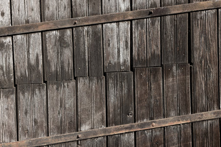 Weathered Old Barn Door Made of Pinewood Planks