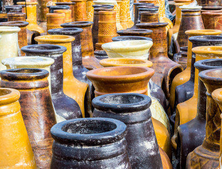 rows of colorful ceramic pottery freestanding fireplacesの写真素材