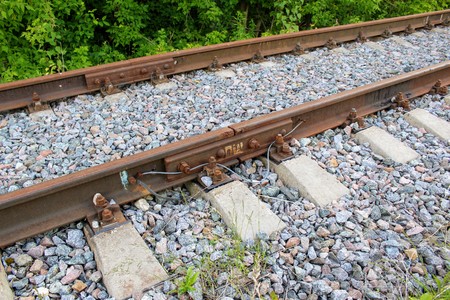 Rusty track rails. The railway track itself is new, the rails are from time to time.の写真素材