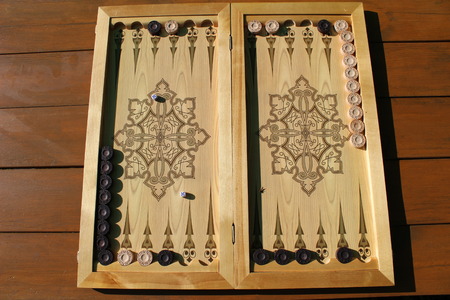 Backgammon is another ancient game, which is great develops of logical thinking skills.