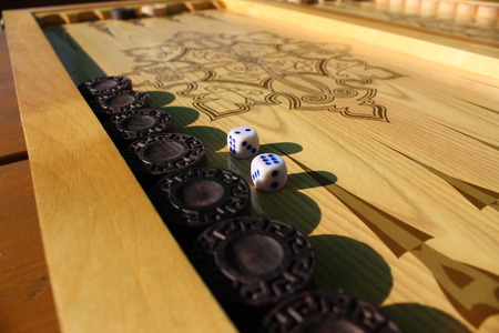 Backgammon is another ancient game, which is great develops of logical thinking skills.