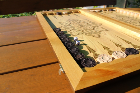 Backgammon is another ancient game, which is great develops of logical thinking skills.