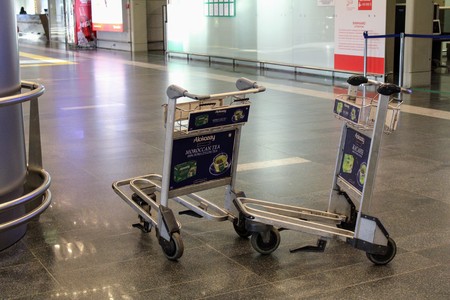 Handcarts for luggage at the international airport Vnukovo (Moscow) - July 2017.のeditorial素材