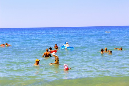 July, 2017 - Vacationers bathe in the sea and sunbathe in the sun on Cleopatra Beach (Alanya, Turkey).のeditorial素材