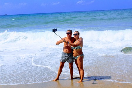 July, 2017 - A married couple makes self-standing in the surf zone on Cleopatra Beach (Alanya, Turkey).のeditorial素材