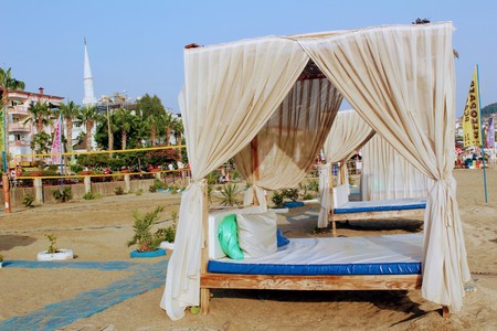 July, 2017 - Bed with canopy on the beach in Alanya, Turkey.のeditorial素材
