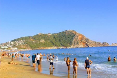 July, 2017 - Vacationers bathe in the sea and sunbathe in the sun on Cleopatra Beach (Alanya, Turkey).のeditorial素材