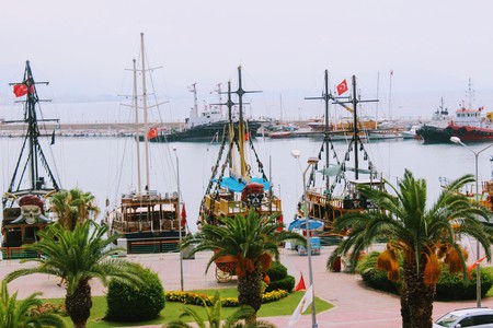 Sailing ships for sea excursions in the city harbor (Antalya, Turkey).のeditorial素材