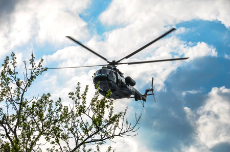 MI-8AMTSh, MI-17, MI-171SH very low over Moscow, Russia on a background of clouds, photographed near the Kremlinのeditorial素材