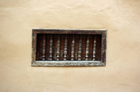 vintage niche with carved wood rodsの写真素材