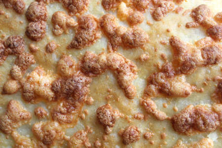 texture of white bread and baked cheeseの写真素材