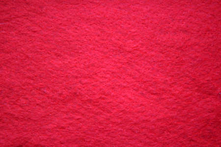 red background made of synthetic material sock for gifts for Christmas and New yearの写真素材
