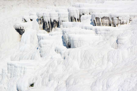 the background of the white Pamukkale travertines without waterの写真素材
