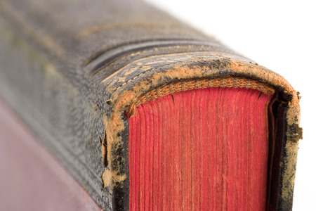 Close-up of an old book's spine, selective focus