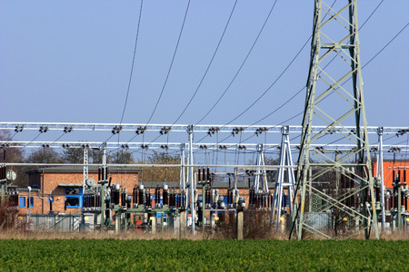 Power pole leading to an electric substation.