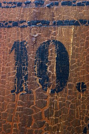 Grungy number 10 on an old church pew (more numbers are coming)