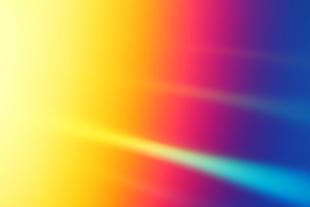 Abstract colored gradient background in yellow, red, magenta, blue and green