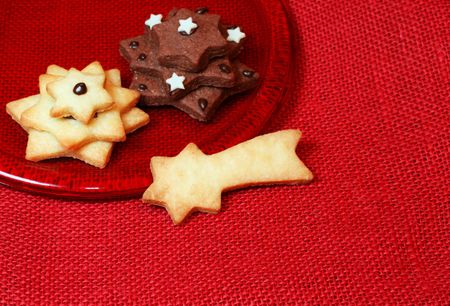 Star shaped christmas cookies on a plate with copy spaceの写真素材