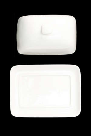 empty and open butter dish on black backgroundの写真素材