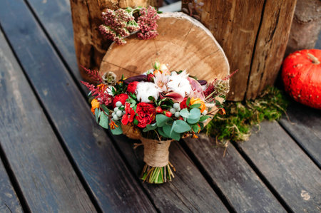Wedding bouquet in rustic style on wooden floor.の写真素材