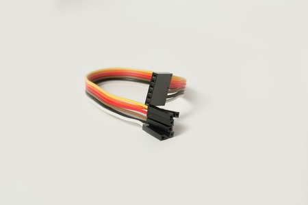Multicolor cable isolated on white background, Networking concept. Jumper, IDC wire. Top view.