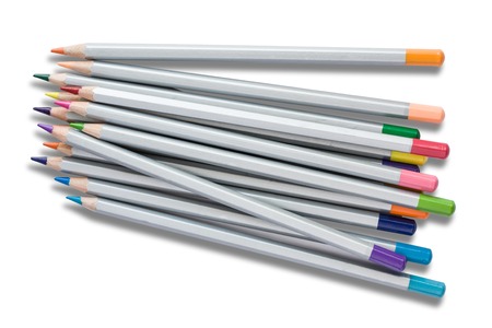 pensils in red green blue yellow white and others isolated on background with text spaceの写真素材