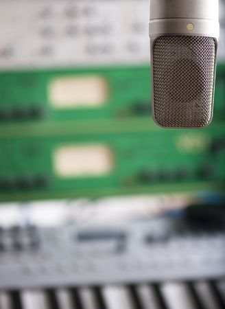 Microphone with studio gear in the  background の写真素材