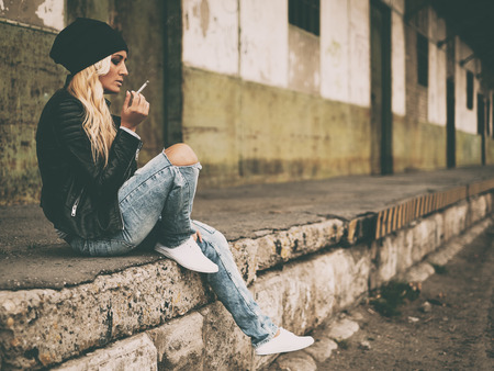 Cute blonde young girl side viewの写真素材