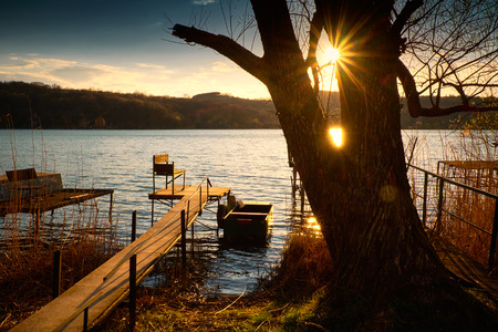 Boat lake sunset pierの写真素材