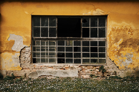 Abandoned old building windowの写真素材