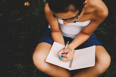 Woman studying outdoorの写真素材