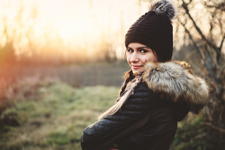 Winter portrait of young woman with braided hairの写真素材