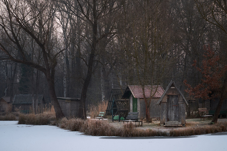 Fishing huts on winter lakeの写真素材