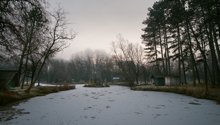 Fishing huts on winter lakeの写真素材