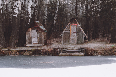Fishing huts on winter lakeの写真素材
