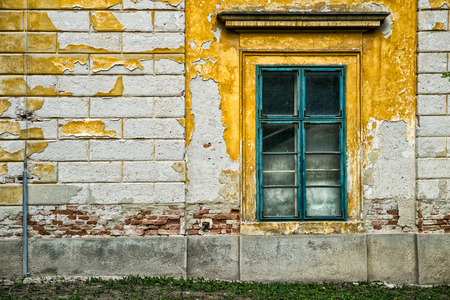Old building damaged facade windowの写真素材