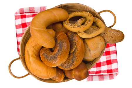 Rolls and buns in a baset isolated on whiteの写真素材