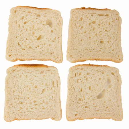 Bread slices isolated on whiteの写真素材