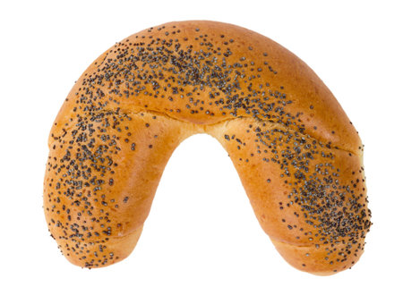 Roll with poppy seeds isolated on whiteの写真素材