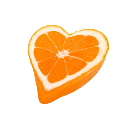 Photo of orange slice in a heart shapeの写真素材