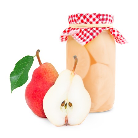 Photo of glass with canned pears isolated on whiteの写真素材