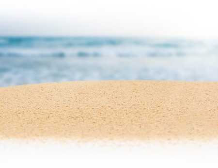 Photo of sand and ocean texture with white space for textの写真素材