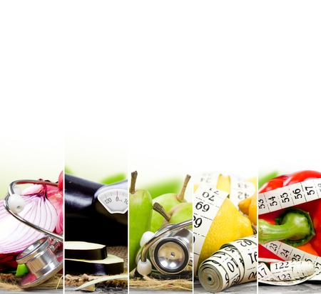 Photo of colorful fruit and vegetable mix with measuring tape, stethoscope and scale meter; concept of fitnessの写真素材