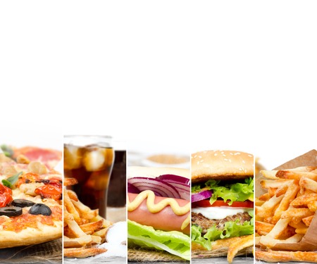 Photo of mix stripes with various kinds of fast food and drinks; white space for textの写真素材