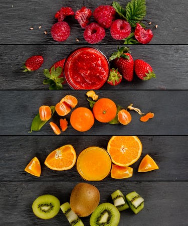 Top view of colorful mix stripes with fruit, drinks and slices; healthy eating conceptの写真素材