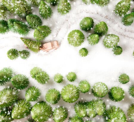 Car transporting a tree in a forest covered with snow. Christmas concept. White space for the text.の写真素材