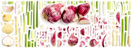 Large collection of garlic vegetable pieces, slices and leaves isolated on white.